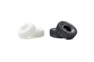 Two Pro-Line 1.9 inch Mickey Thompson Baja Pro XS crawler tyres and two white foam inserts isolated on a white background.