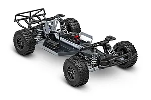 A studio shot of a Traxxas Slash 2WD RC short course truck chassis without the body shell, showing the suspension, wheels, and electronic components.