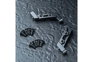 Two black anodized aluminium bulkhead parts for an RC car, accompanied by eight small black countersunk screws, arranged on a dark textured surface.