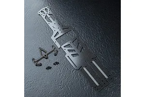 MST carbon fiber RC chassis lower deck components and mounting hardware on a textured black surface.