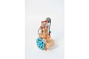 A Teching DM117 single cylinder engine model kit featuring gold, blue, and red metallic components against a white background.