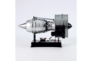 Side view of a Teching DM121 civil turbofan engine model kit mounted on a black display base against a white background.