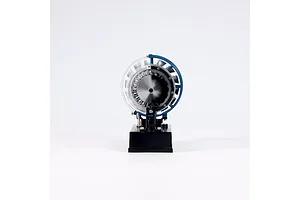 Front view of the Teching DM122 mini turbofan engine model kit showing the fan blades and internal structure on a black base.