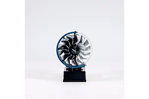 Front view of the Teching DM122 mini turbofan engine model kit showing the fan blades and blue casing on a black display stand.