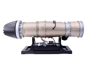 Side view of a Teching DM135 small bypass turbofan engine model kit mounted on a black plastic display stand against a white background.