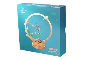 Teching DM336 Dragonfly metal model kit packaging box showing a finished mechanical dragonfly model on a circular stand.