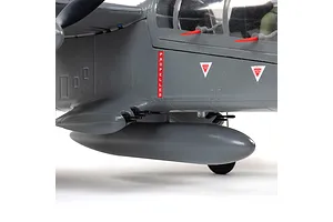 Close-up of the fuselage of an E-Flite Micro OV-10 Bronco RC plane, showing grey paint, propeller warning labels, and ejection seat markings.
