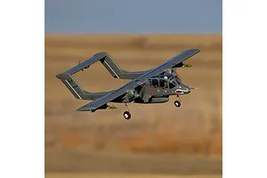An E-Flite Micro OV-10 Bronco RC plane in flight against a blurred outdoor background.