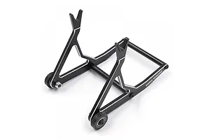 A black Yeah Racing aluminium RC car stand with silver chamfered edges and small wheels, viewed from a high angle against a white background.