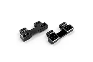 Two black anodized aluminium rear lower arm mounts for RC cars, shown from a high-angle perspective on a white background.