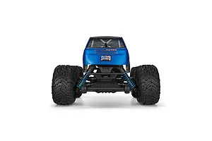 Rear view of the ARRMA Freedom Flyer RC monster truck showing the blue body, large knobby tires, and blue coil-over shocks against a white background.