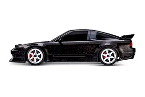 Side profile of a black Traxxas 4-Tec 2.0 Nissan 240SX RC car with white wheels and red brake calipers on a white background.