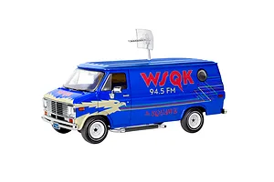 A 1/25 scale model of the blue WSQK 94.5 FM Squawk radio van from Stranger Things, featuring a roof-mounted antenna and custom eagle graphics.
