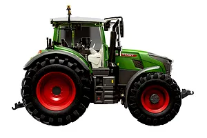 Side view of a 1/24 scale Revell Fendt 728 Vario tractor model, featuring green bodywork, red wheels, and black tires against a white background.