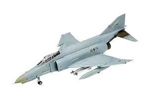 A completed 1/72 scale plastic model of a German F-4 Phantom II jet fighter, painted in light grey with Luftwaffe markings.