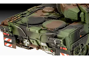 Close-up of the rear deck and engine compartment of a camouflaged Leopard 2A7A1 tank model kit.