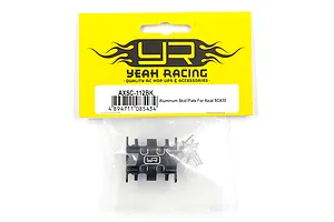 Yeah Racing aluminium skid plate for Axial SCX30 in original yellow and white retail packaging.