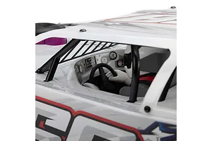 Close-up of the cockpit interior of a Losi 22S Dirt Late Model RC car, showing the driver figure, steering wheel, and detailed dashboard gauges.