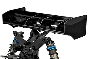 Close-up of the rear wing and shock tower assembly on a Team Associated RC8T4.2e RC truggy against a white background.