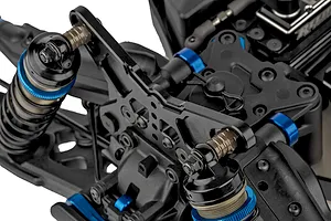 Close-up of the front suspension and shock tower assembly on a Team Associated RC8T4.2e RC truggy.