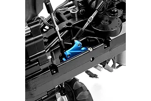 A close-up view of a blue anodized aluminium steering bellcrank installed on a black RC car chassis.