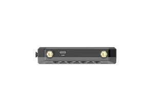 Side view of the CaddxFPV Walksnail Ascent VRX receiver showing two gold antenna ports and a Link button on a dark grey housing.