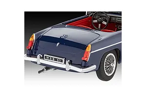 Rear three-quarter view of a dark blue Revell 1/32 scale MGB Roadster model car featuring a red interior and chrome wire wheels.