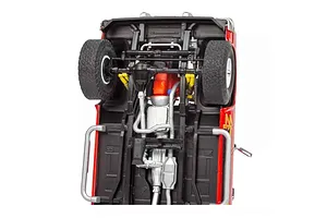 Underside view of a 1/25 scale Revell '85 GMC Jimmy model kit showing the chassis, drivetrain, and suspension details.