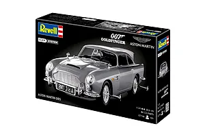 Revell 1/24 scale James Bond Aston Martin DB5 model kit box featuring a silver car with BMT 216A license plate on a black background.