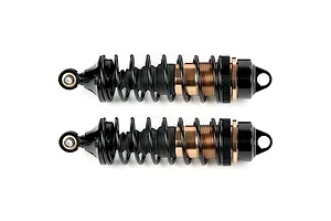 Two Rovan adjustable RC shock absorbers with bronze-coloured bodies and black springs, shown horizontally against a white background.
