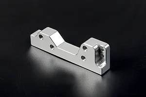 A silver Rovan aluminium engine mount for RC vehicles shown against a dark background.
