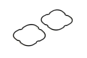 Two black rubber seals with a distinct four-lobed shape, isolated on a white background.