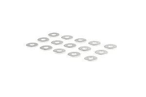 A collection of small silver metal washers arranged on a white background.