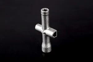 A silver-coloured metal cross wrench tool for RC vehicles, shown against a plain black background.
