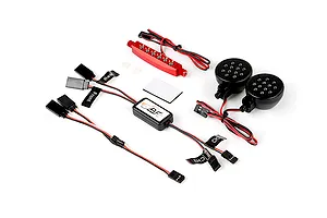 Rovan RC light controller kit including a central control module, two round LED headlight pods, and a red LED light bar with wiring and connectors.