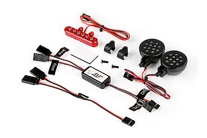 Rovan RC light controller kit including a red LED bar, two round LED light pods, a control module, wiring harnesses, and mounting hardware.