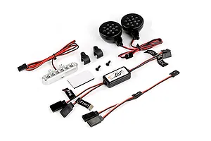 Rovan RC light controller kit including two round black LED headlights, a silver LED light bar, control module, wiring harnesses, and mounting hardware.
