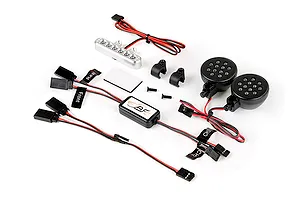 Rovan RC light controller kit including a central control module, two round black LED light pods, a silver light bar, wiring harnesses, and mounting hardware.