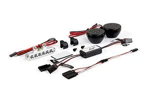 Rovan RC light controller kit including a silver LED light bar, two round black LED light pods, a control module, and wiring harnesses.
