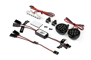 Rovan RC light controller kit including a central control module, two round front LED light pods, one silver rear LED light bar, and wiring harnesses.