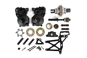 A flat-lay view of a Rovan 1/5 scale Baja RC car transmission assembly kit including plastic gearbox halves, metal gears, shafts, and mounting hardware.