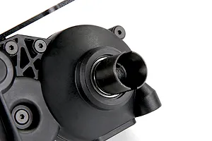 Close-up of a black plastic RC gear differential transmission assembly for a 1/5 scale Baja vehicle.