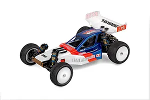 Studio product shot of a Team Associated RC10 1/10 scale electric RC buggy with blue, white, and red body graphics against a plain white background.