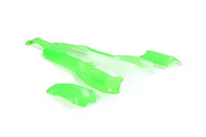Green painted RC buggy body shell panels laid out on a clean white background.