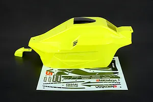 Bright yellow painted RC buggy body shell with a black roof scoop and accompanying sticker sheet on a dark background.