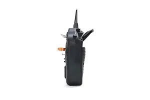 Right profile view of the Spektrum NX8+ 20ch DSMX transmitter showcasing switches, thumb stick, and textured grip against a white background.