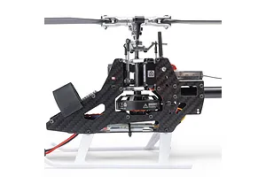 Close-up side view of the Blade InFusion 210 RC helicopter main frame, rotor head, electronics, and motor against a white background.