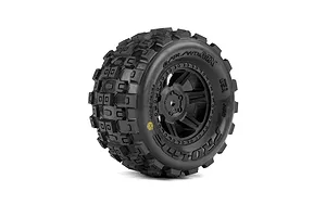 Pro-Line 1/16 Badlands MX tyre glued onto a black Desperado 2.0 wheel rim against a white background.
