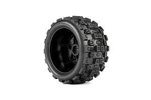 Pro-Line 1/16 Badlands MX tyre glued to a black Desperado wheel rim against a white background.