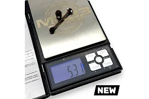 RC Maker driveshaft components being weighed on a digital scale showing 5.31 grams.